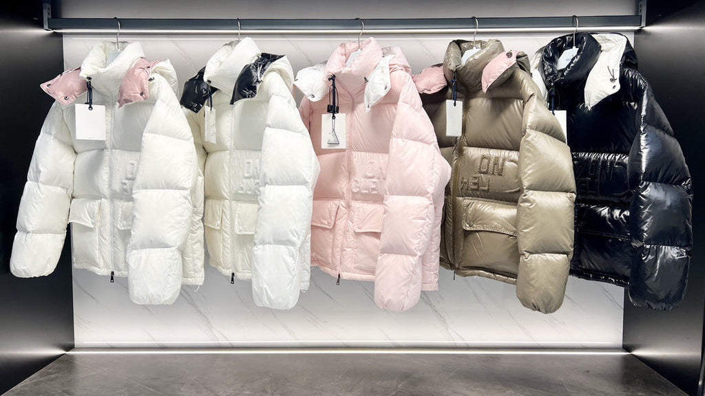 White puffer jacket with the letter P