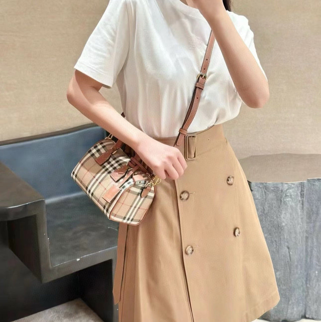 Minibolso estructurado con asa superior