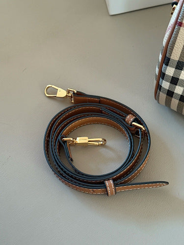 Minibolso estructurado con asa superior