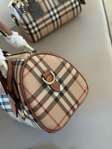 Minibolso estructurado con asa superior