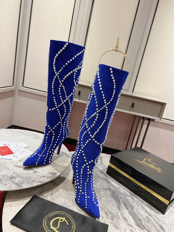 Women's blue suede stiletto boots with crystal embellishments