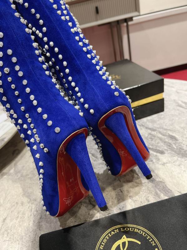 Women's blue suede stiletto boots with crystal embellishments
