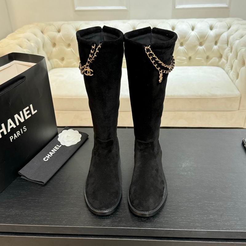 Black suede knee-high boots