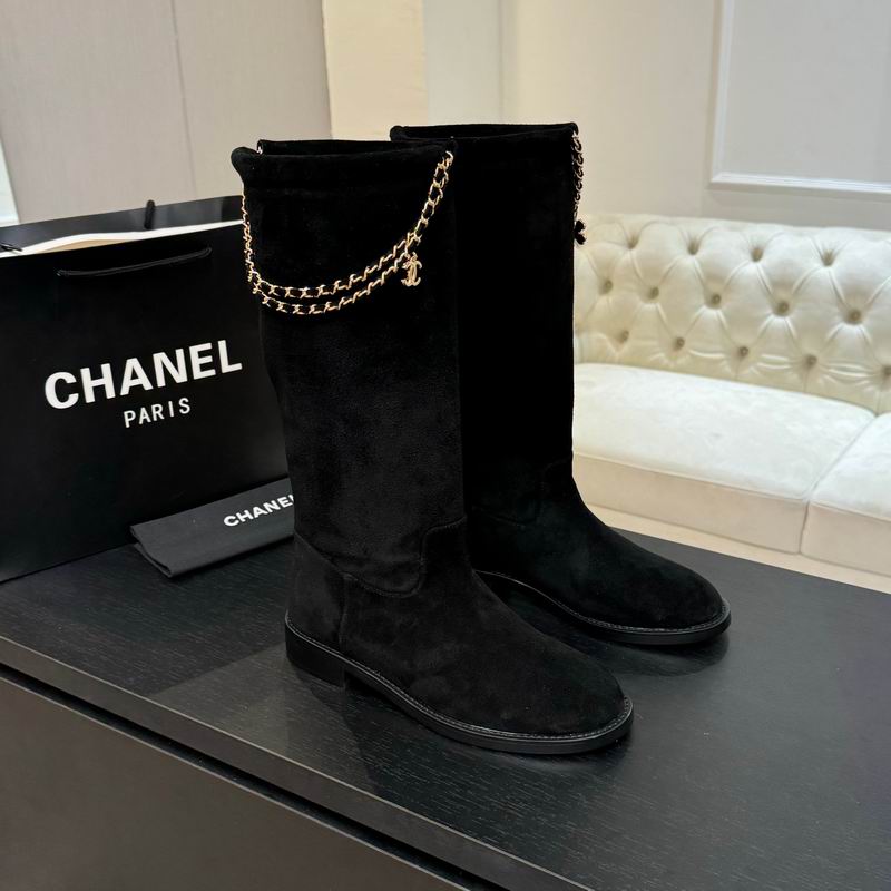 Black suede knee-high boots
