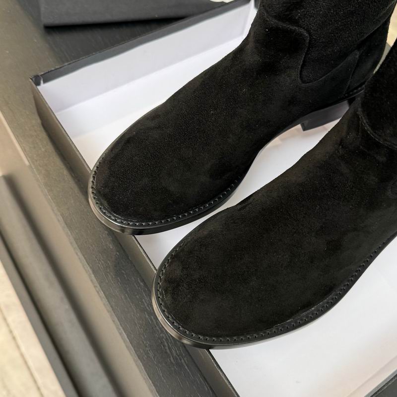 Black suede knee-high boots
