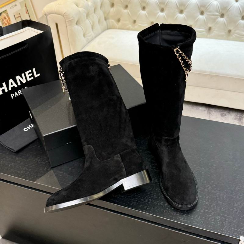 Black suede knee-high boots