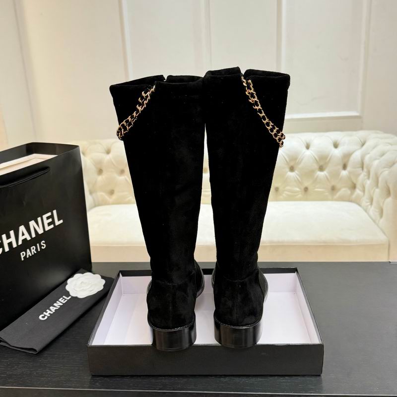 Black suede knee-high boots