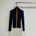 Chaqueta azul marino de canalé con cremallera
