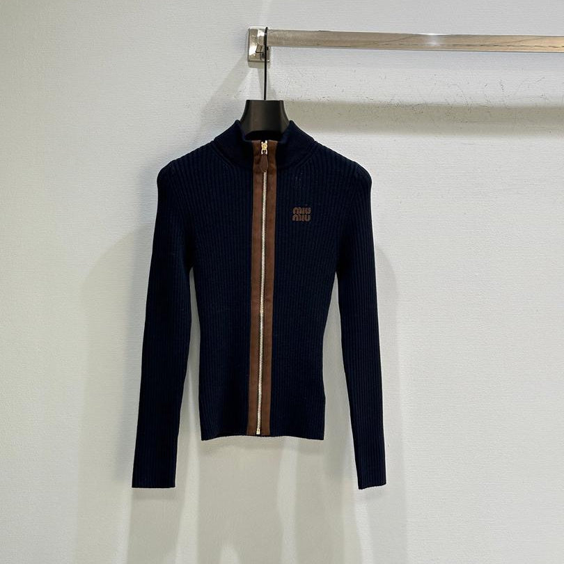 Chaqueta azul marino de canalé con cremallera