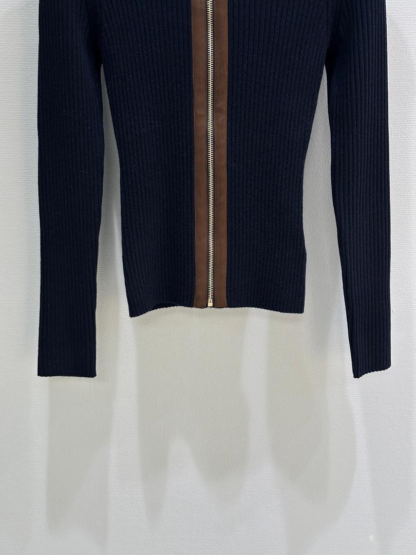 Chaqueta azul marino de canalé con cremallera
