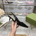 Klassische Lacklederpumps