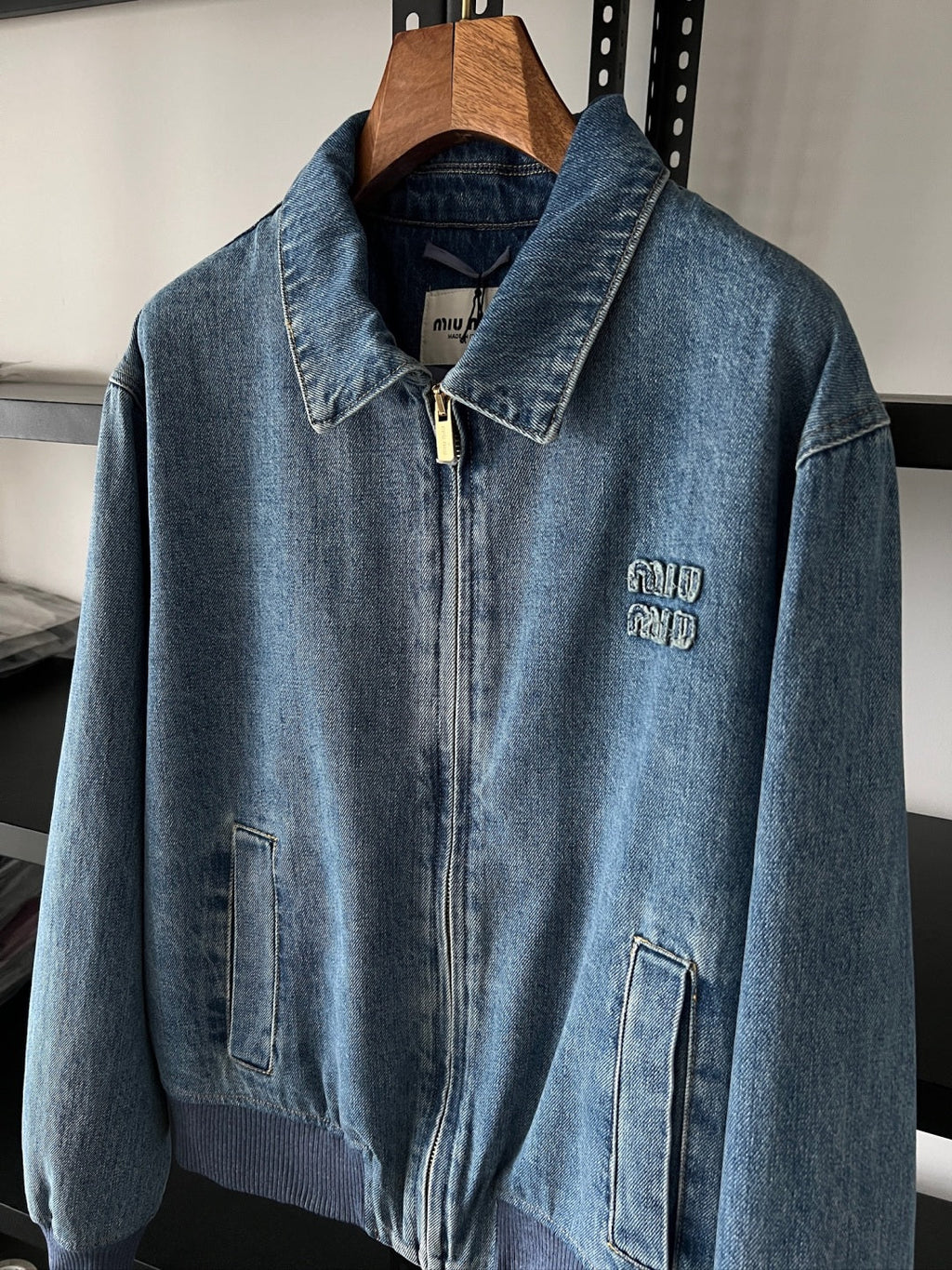 Embroidered washed denim jacket