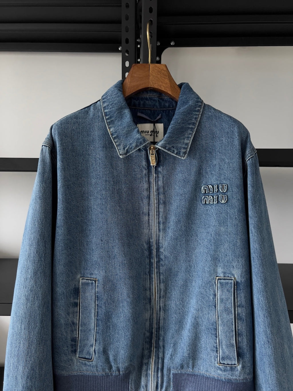 Embroidered washed denim jacket
