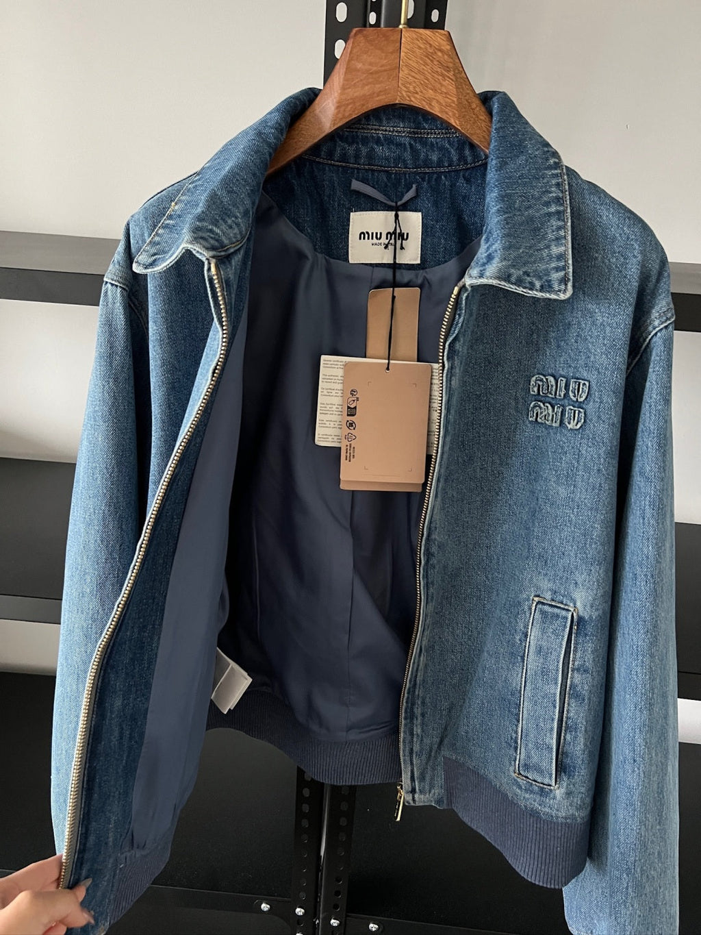 Embroidered washed denim jacket