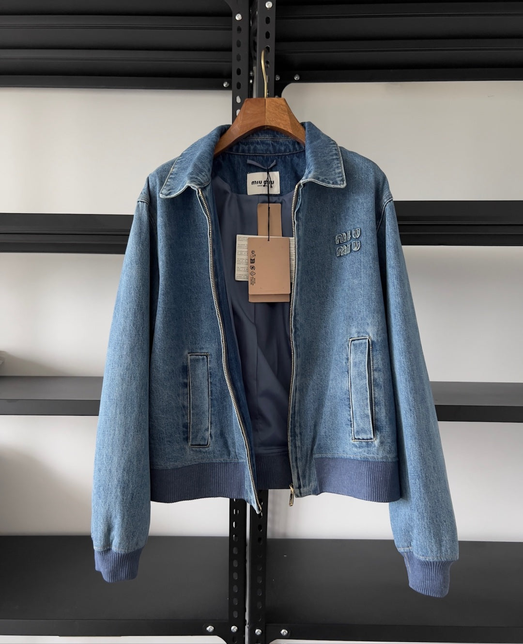 Embroidered washed denim jacket