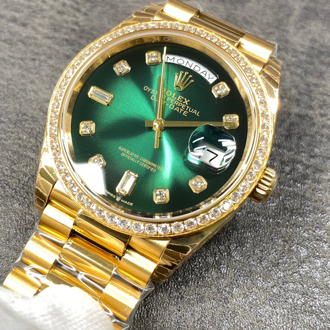 Automatic 36mm watch with green and gold dial
