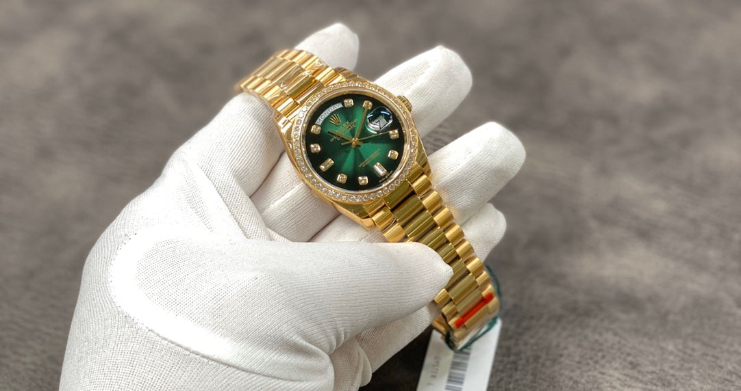 Automatic 36mm watch with green and gold dial