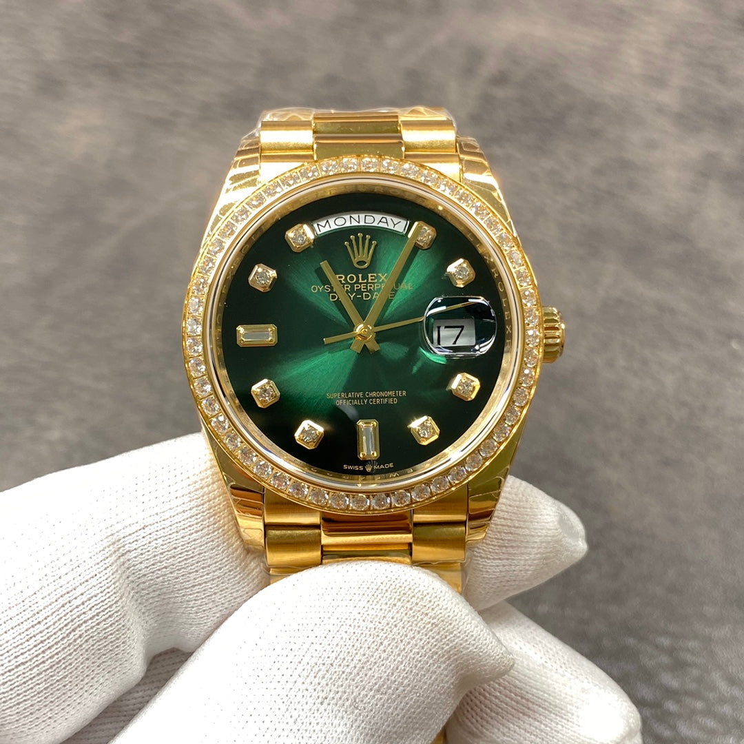Automatic 36mm watch with green and gold dial