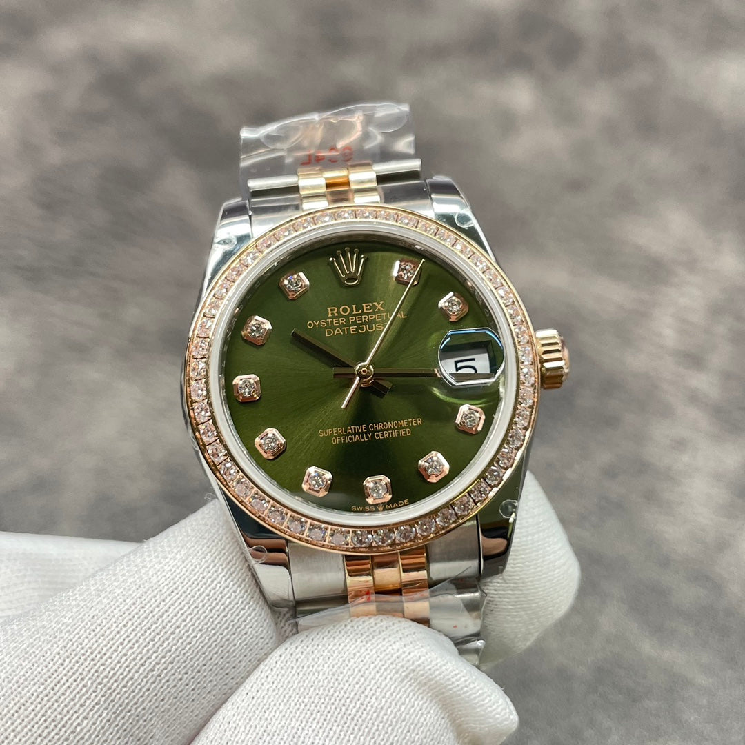 31 mm wristwatch with golden mother-of-pearl dial