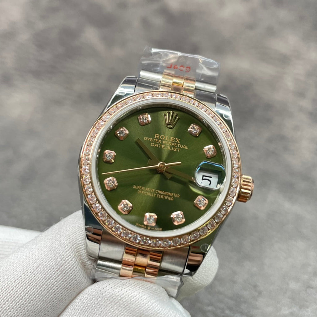 31 mm wristwatch with golden mother-of-pearl dial
