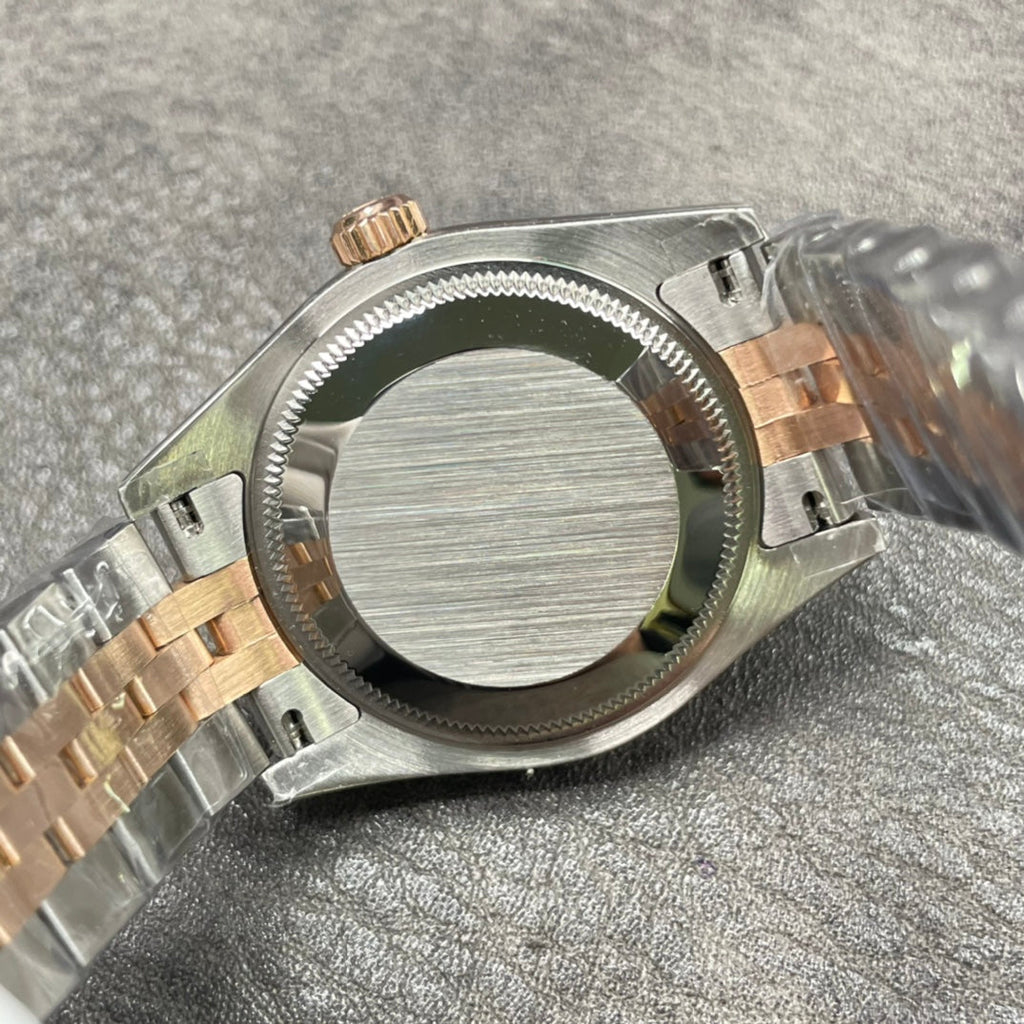 31 mm wristwatch with golden mother-of-pearl dial