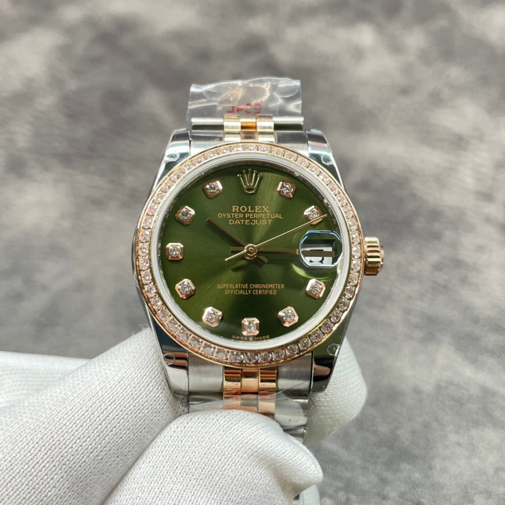 31 mm wristwatch with golden mother-of-pearl dial