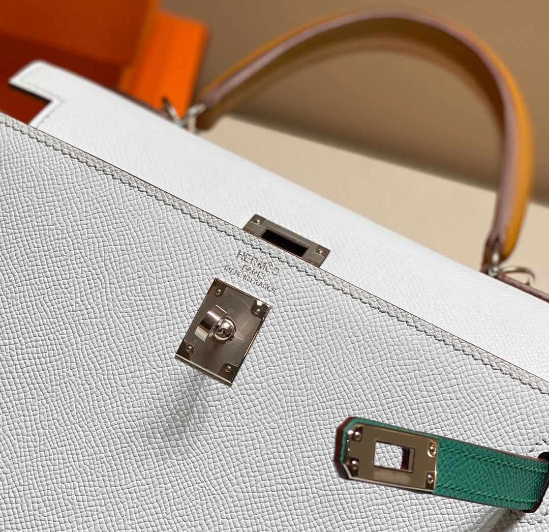 Tricolor-Lederhandtasche 28