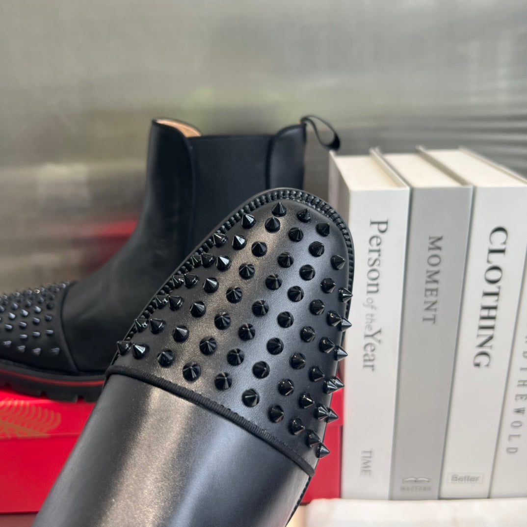 Black cowhide boots with front studs