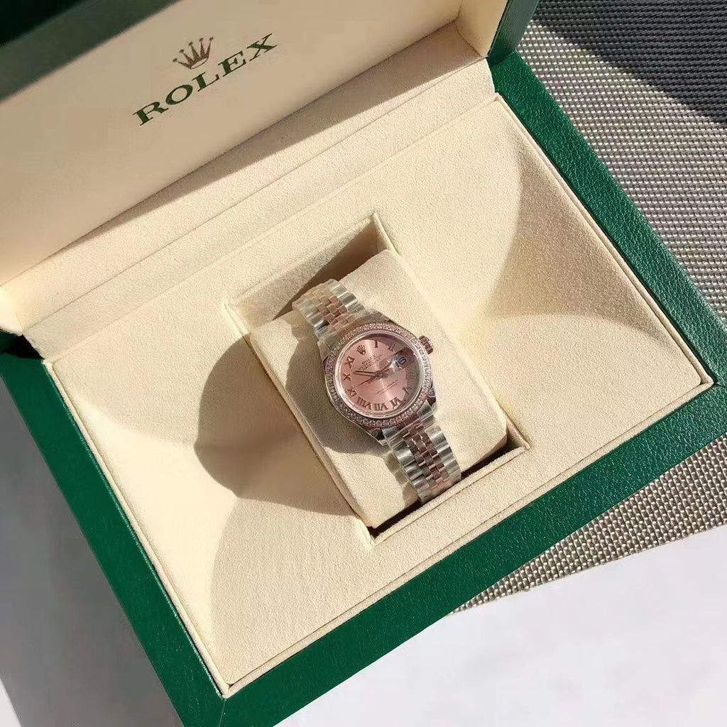Uhr mit zweifarbigem rosafarbenem Zifferblatt