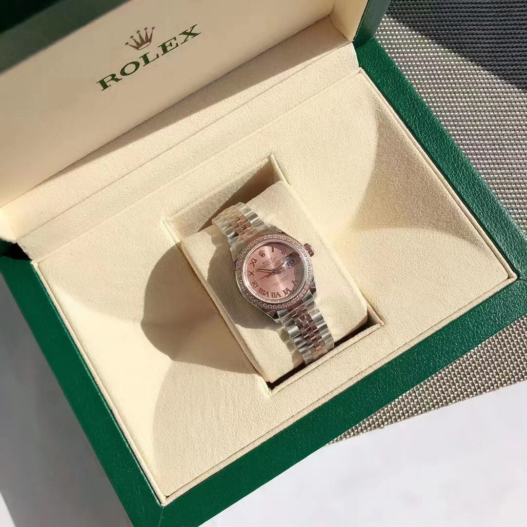 Uhr mit zweifarbigem rosafarbenem Zifferblatt