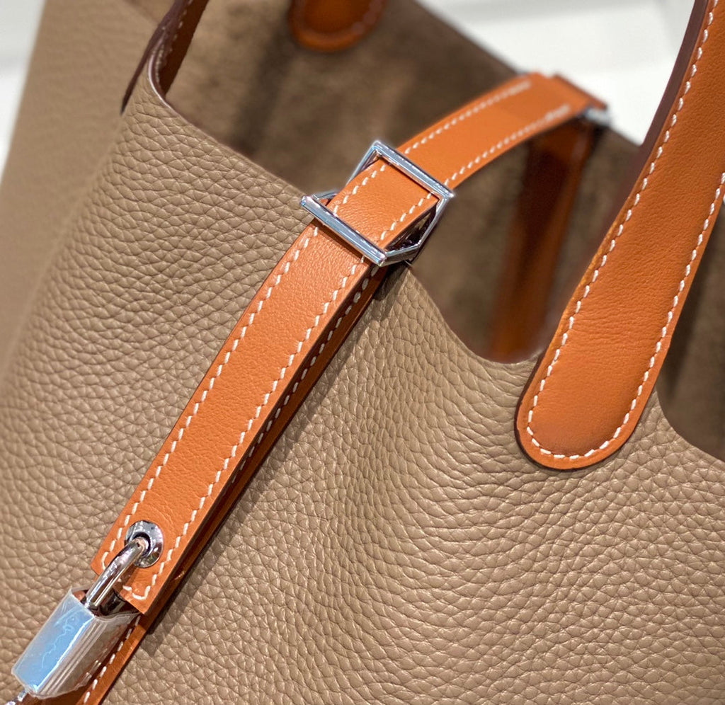 Bolso bombonera de gabardina encerada
