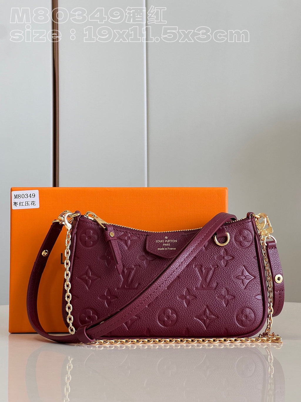 Bolso de hombro de piel repujada