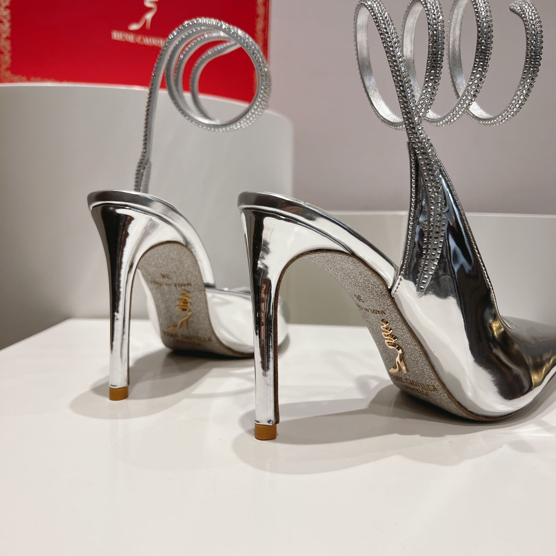 Cleo Slingback-Pumps mit Schlangenmuster