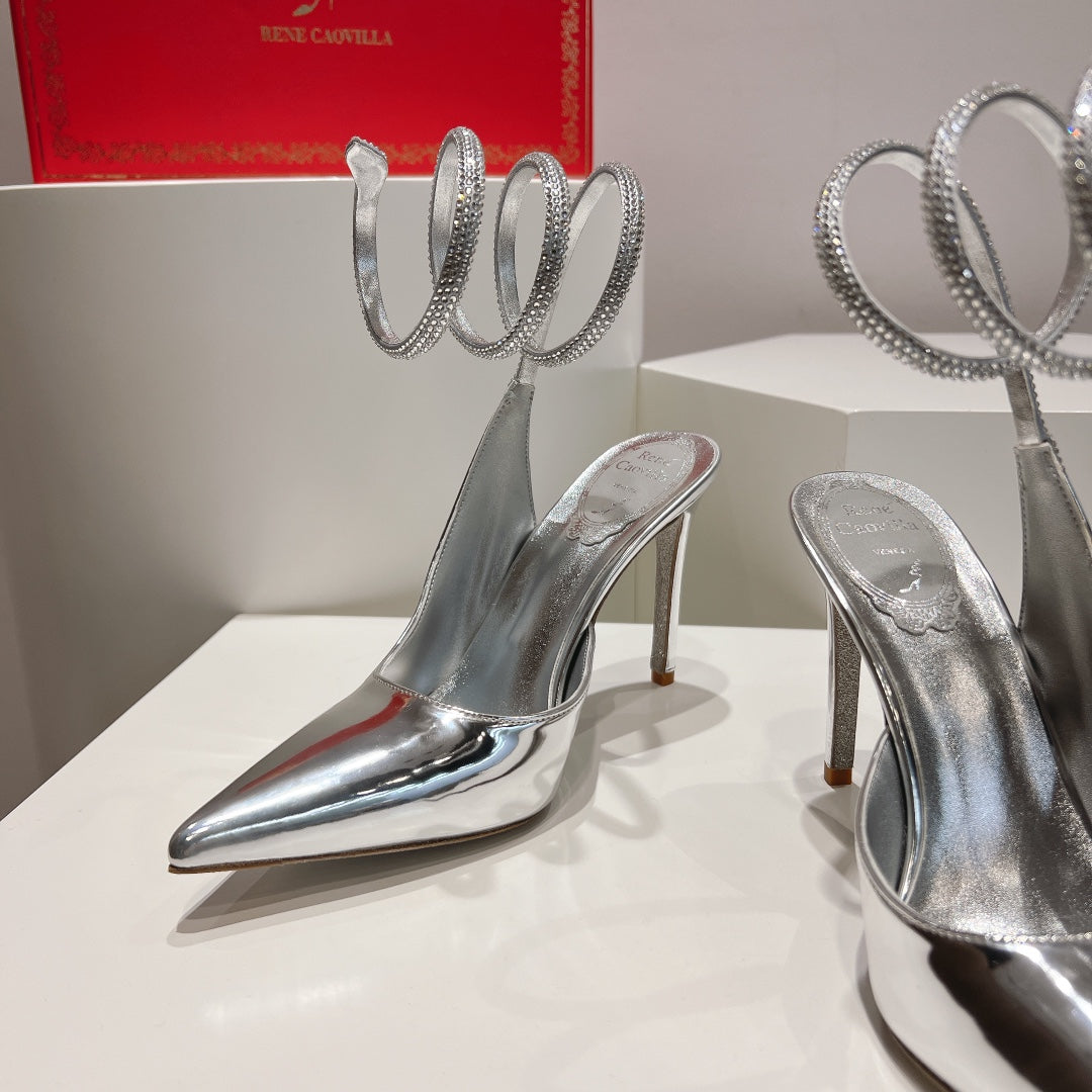 Cleo Slingback-Pumps mit Schlangenmuster