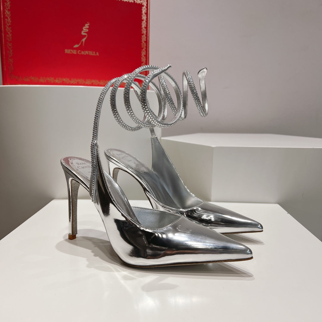 Cleo Slingback-Pumps mit Schlangenmuster