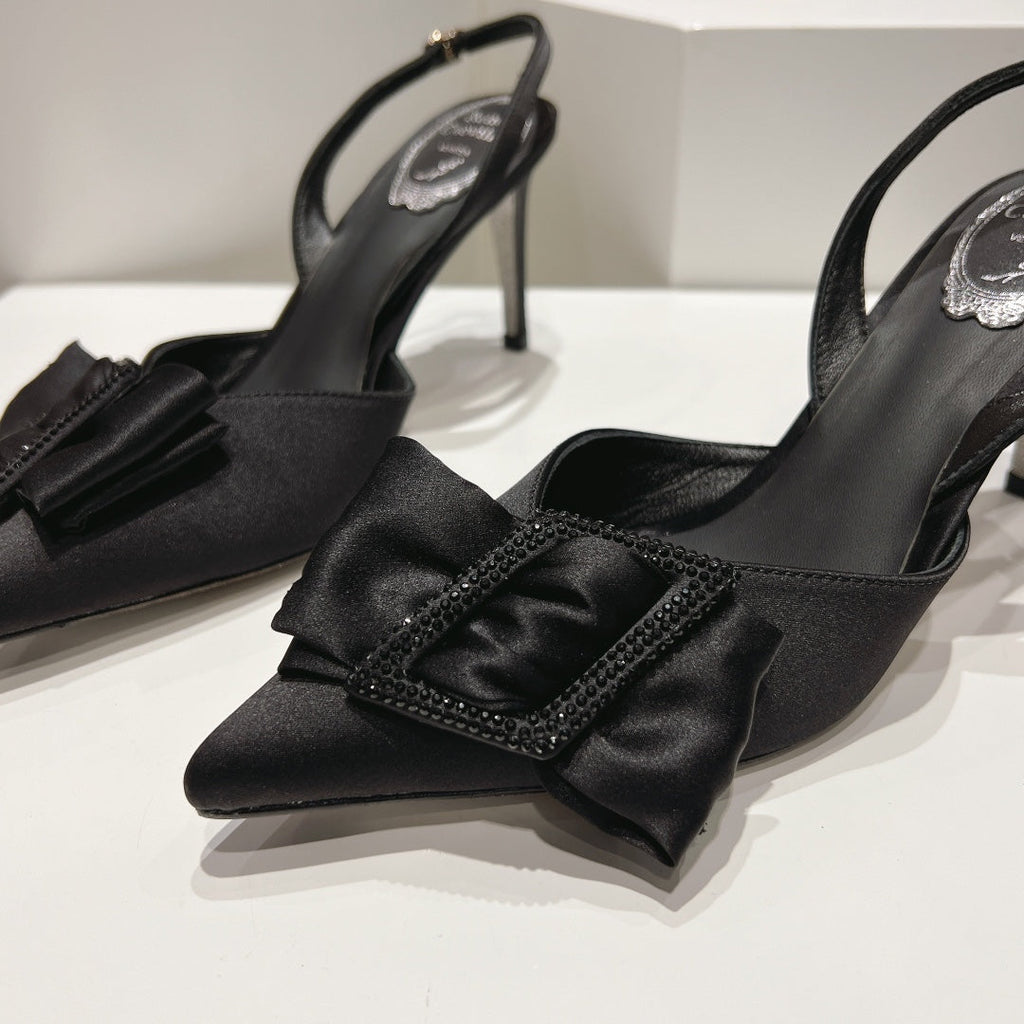 Glass heels with silk bow