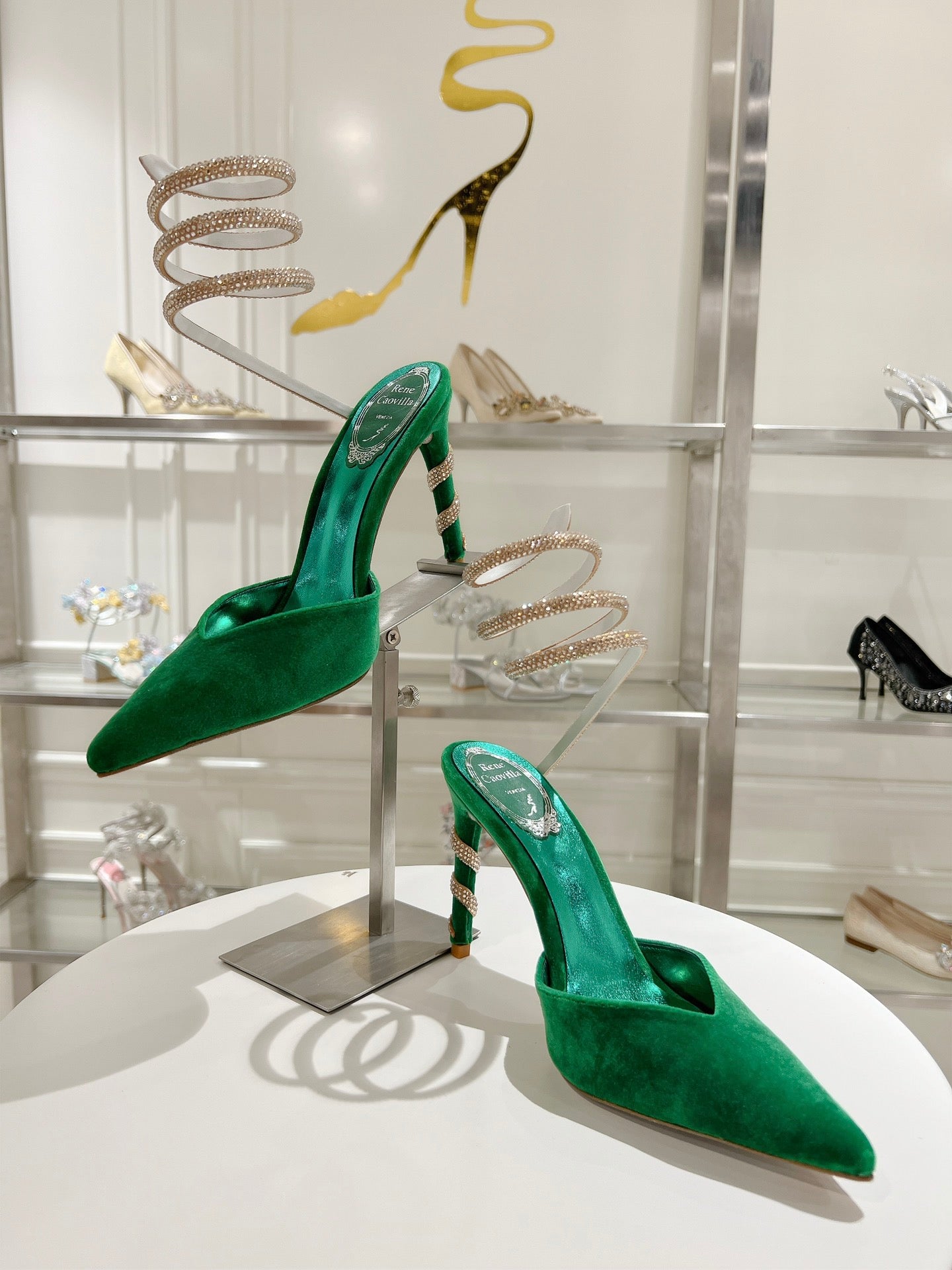Cleo Pumps mit Schlangenmuster