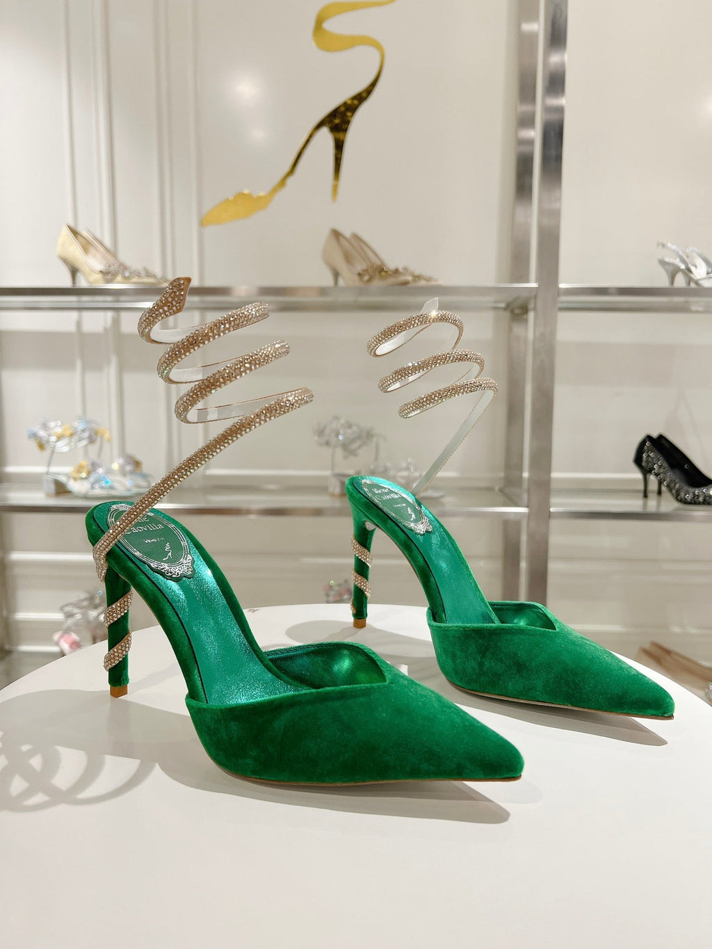 Cleo Pumps mit Schlangenmuster