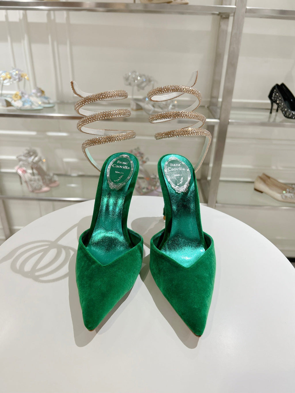 Cleo Pumps mit Schlangenmuster