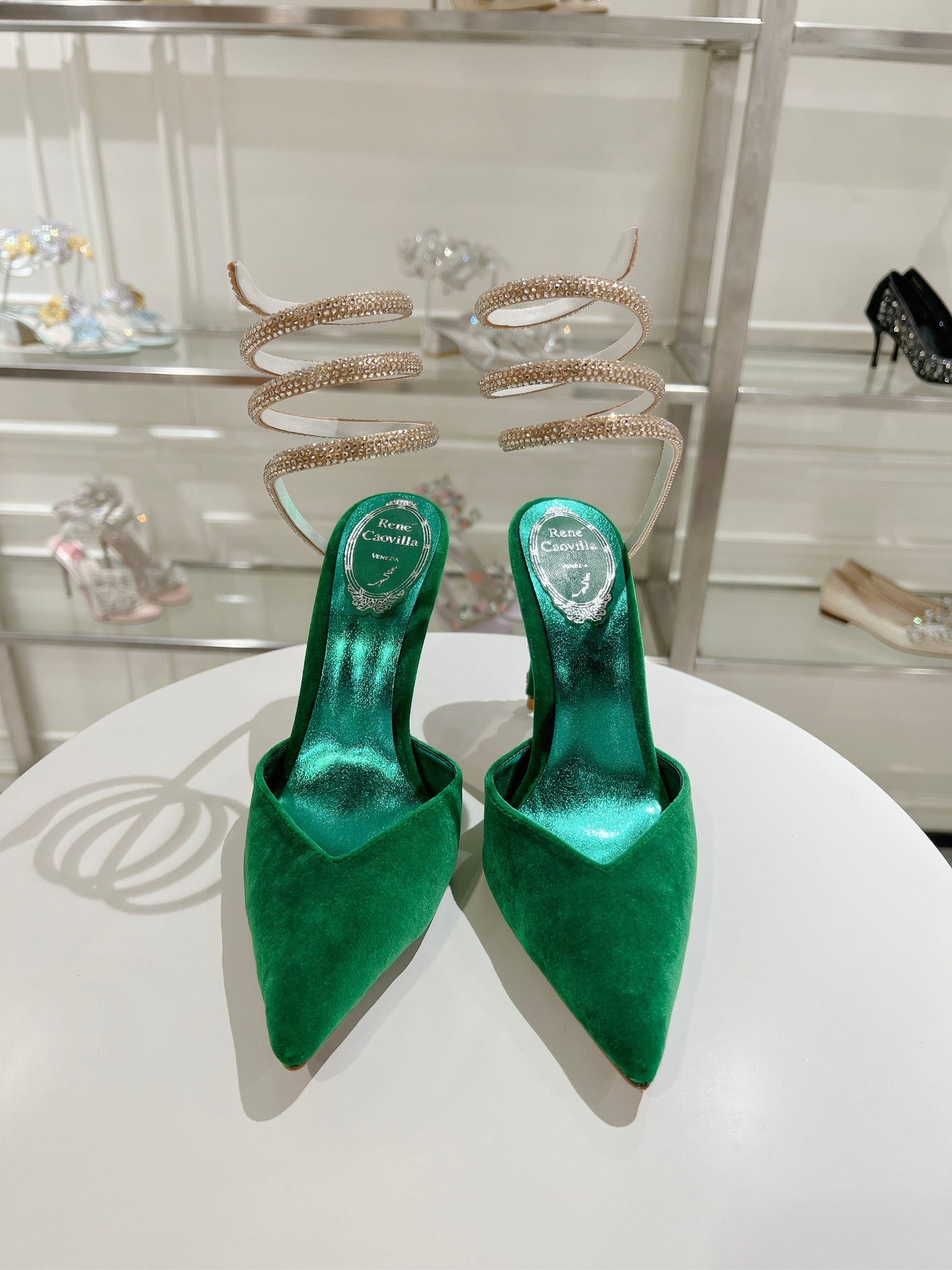 Cleo Pumps mit Schlangenmuster