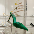 Cleo Pumps mit Schlangenmuster