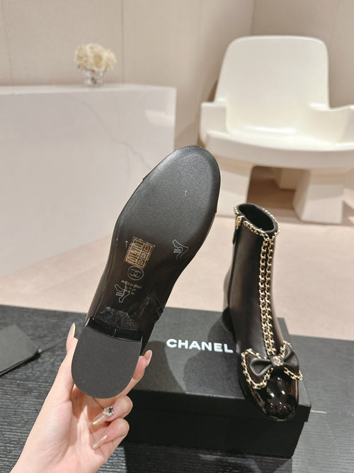 Botas altas de cuero bordadas para mujer