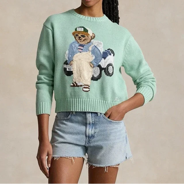 Mintgrüner Golf-Bärenpullover