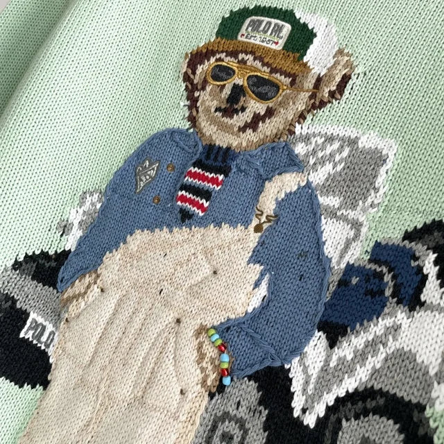 Mintgrüner Golf-Bärenpullover