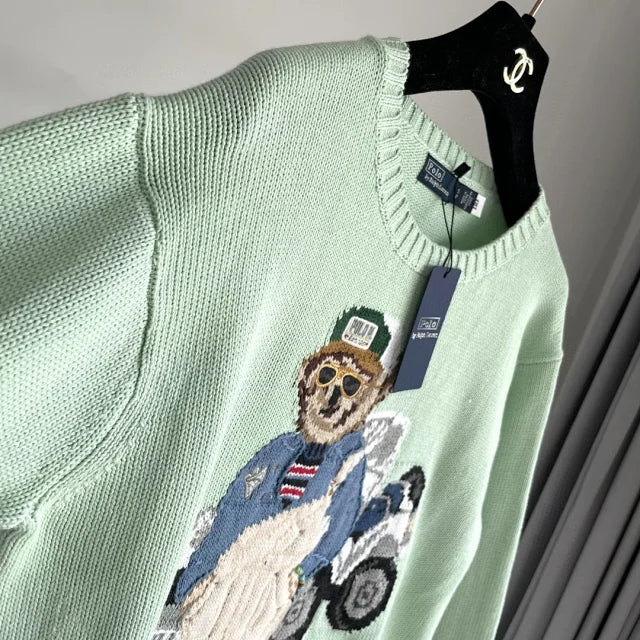 Mintgrüner Golf-Bärenpullover