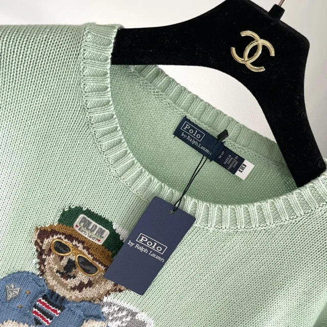 Mintgrüner Golf-Bärenpullover