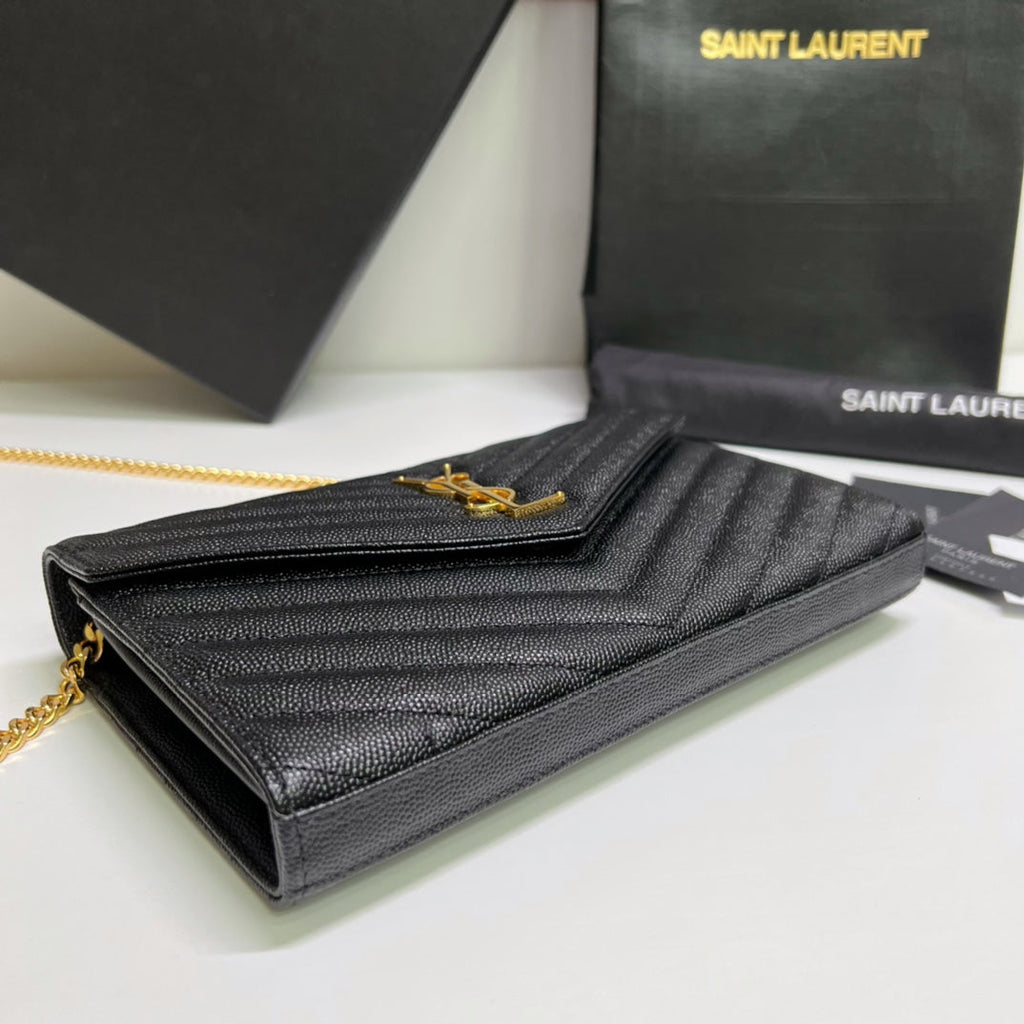 Quilted leather wallet with chain